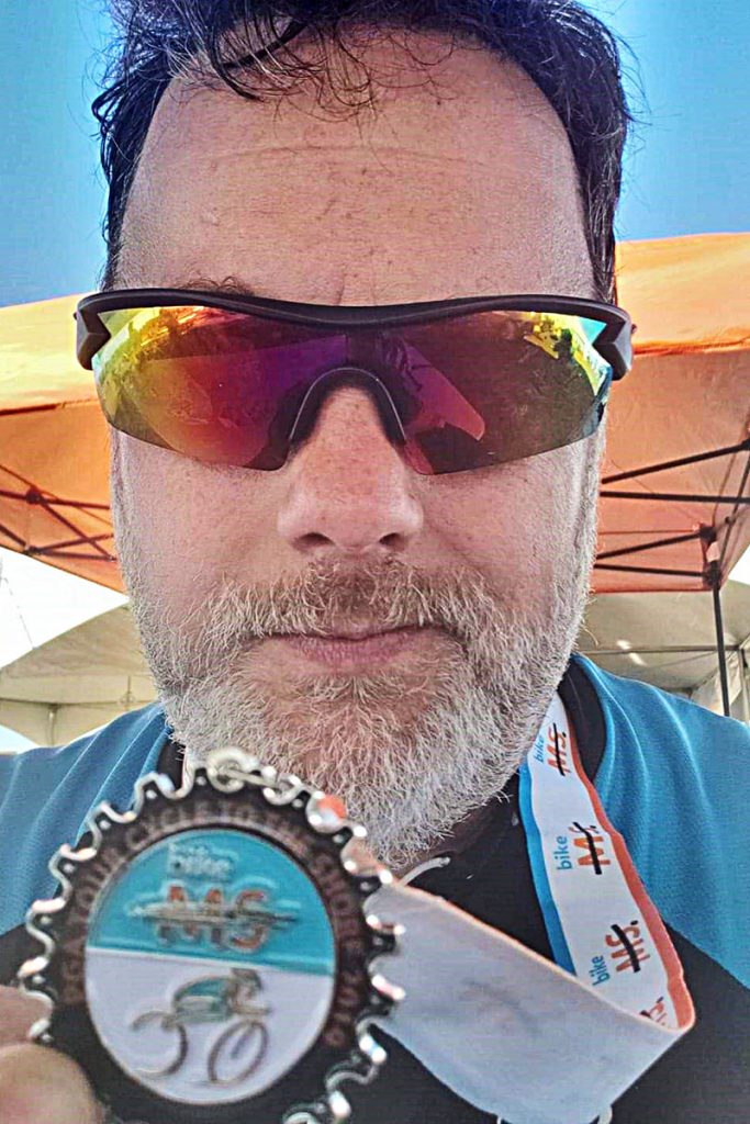 Gavin Turner at the finish line of his 9th annual Bike MS Cycle to the Shore event in 2019, which raises money and awareness for Multiple Sclerosis