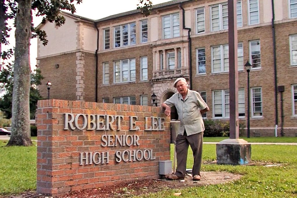 The late Stetson Kennedy, a 1932 graduate of Robert E. Lee High School, stands outside his alma mater. There is a grassroots effort within the Riverside community to name the school after Kennedy, who was a champion for civil rights, author of seven books including “The Klan Unmasked”and “The Jim Crow Guide.” Kennedy infiltrated the Ku Klux Klan in the 1940s and exposed their illegal activities to the House Un-American Activities Committee. He died in 2011 at the age of 94. The Stetson Kennedy Foundation carries on his legacy of standing for human rights, stewardship of the environment, and preserving folk culture. A documentary entitled “Klandestine Man,” about his life is currently in production.