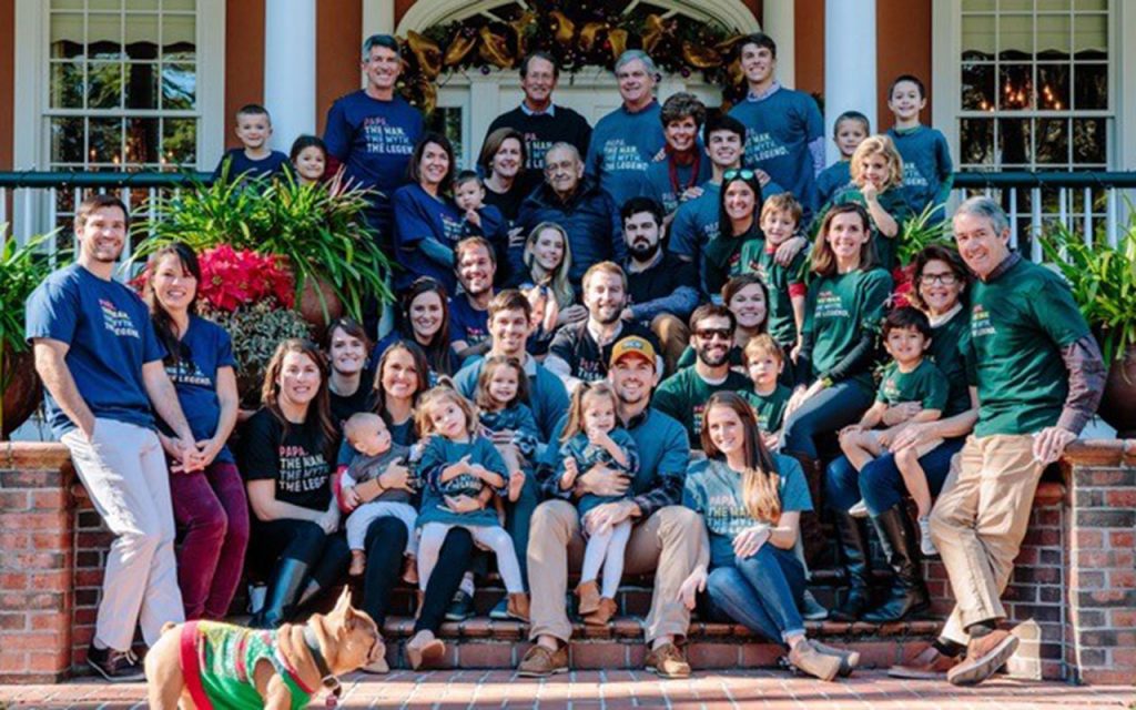 Members of the Skinner family wear tee shirts denoting “Papa …The Man … The Myth … The Legacy,”  
as they gather with their family patriarch, A. Chester Skinner, during the Christmas holidays.