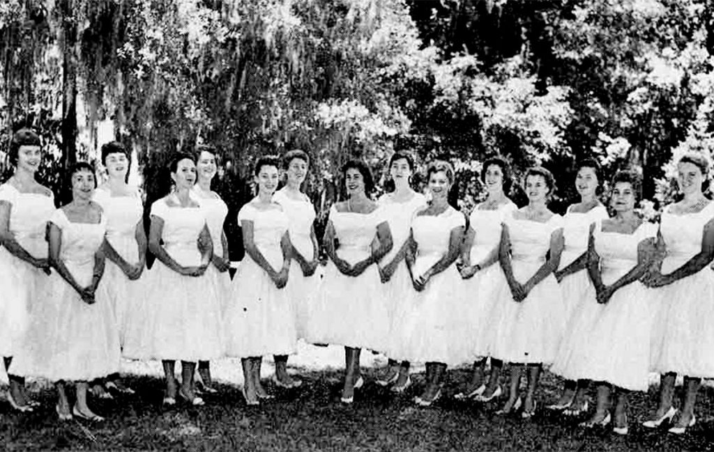 Lulie Liggett Gund and her 1958 Bartram classmates. Gund is in the back row, far left