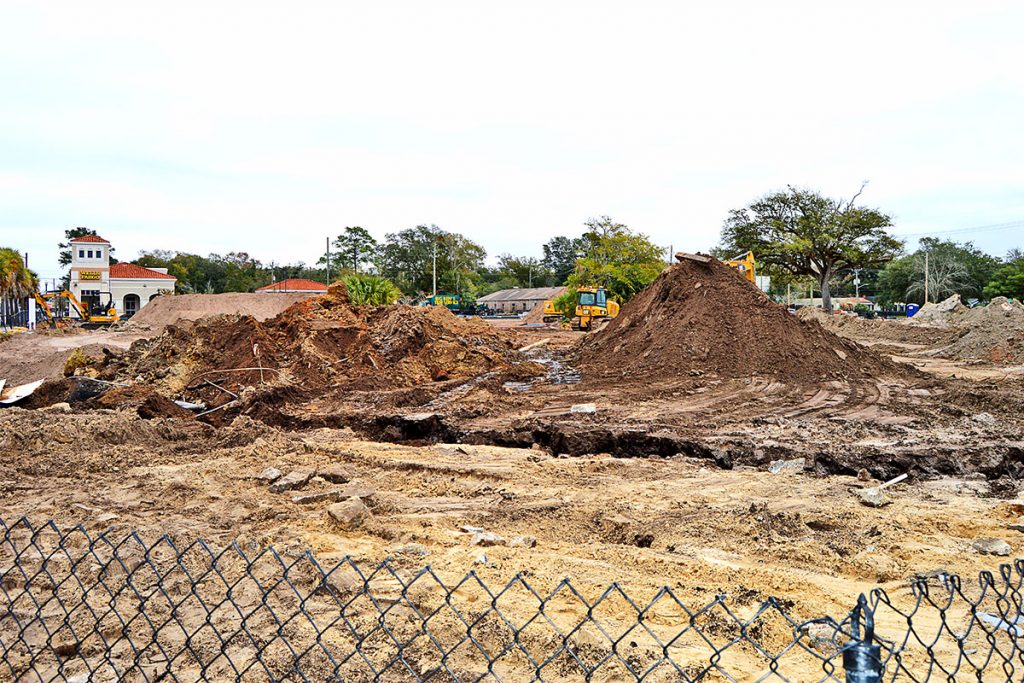 Large piles of dirt and earth-moving equipment on the East San Marco Shopping Center site show signs of progress that long-awaited Publix is coming