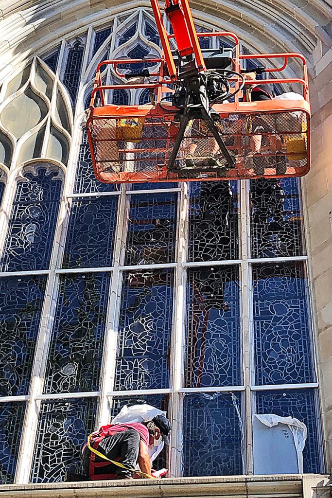 Sister Diane’s crew replaces the Lexan that protects the stained-glass windows at Riverside Presbyterian Church