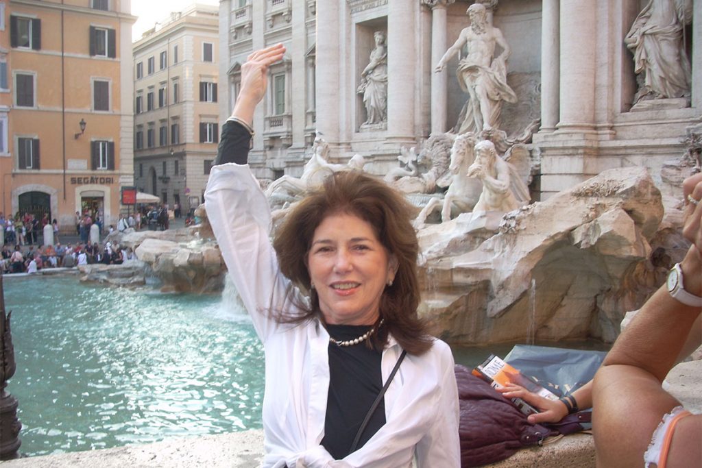 Mary Dudley Schmidt at the Trevi Fountain in Rome  “Toss a coin and you’ll return.”