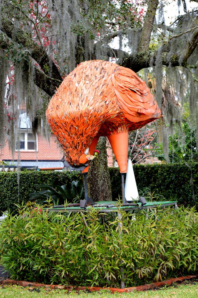 Artist Lana Shuttleworth’s creation of a giant chicken made of 200 safety cones sits in the yard of her home on Riverside Avenue