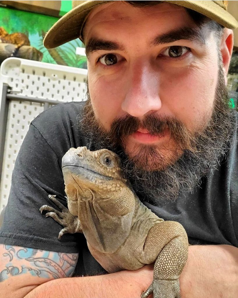 Shane Smith with his pet Rhino Iguana, Phillip.