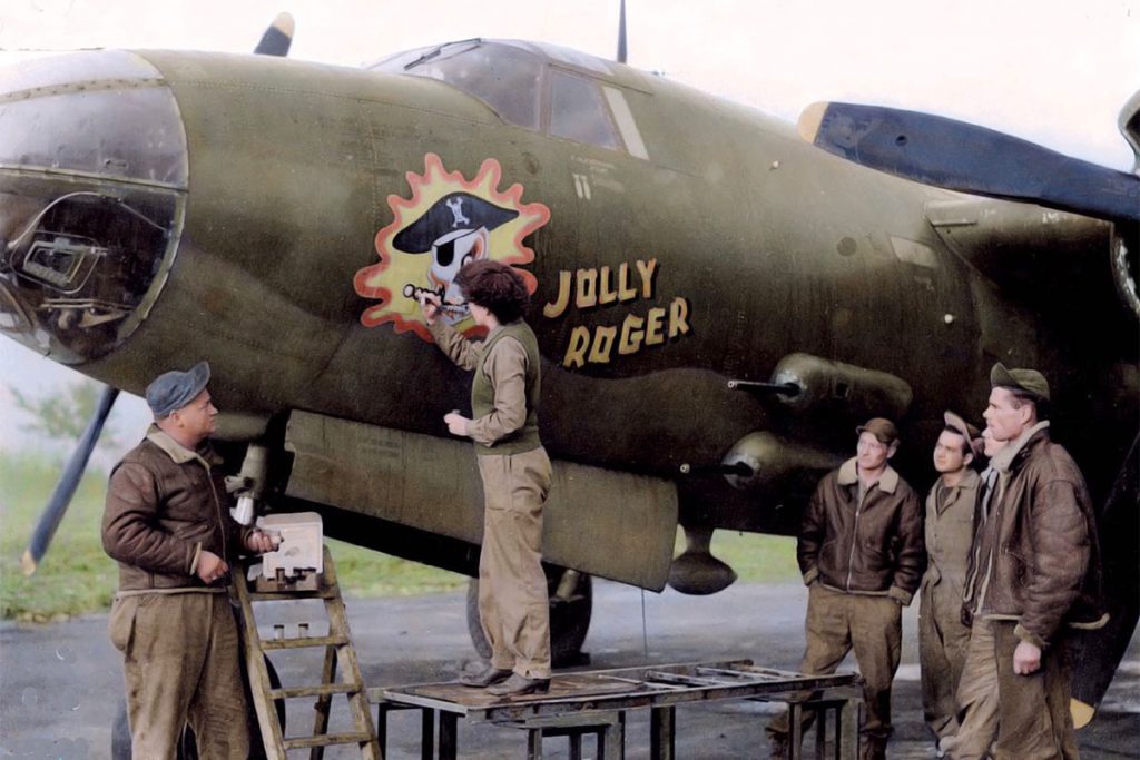 Kuzel’s mother, Barbara O’Brien Kuzel, 9th Air Force in England, paints the nose on a bomber.