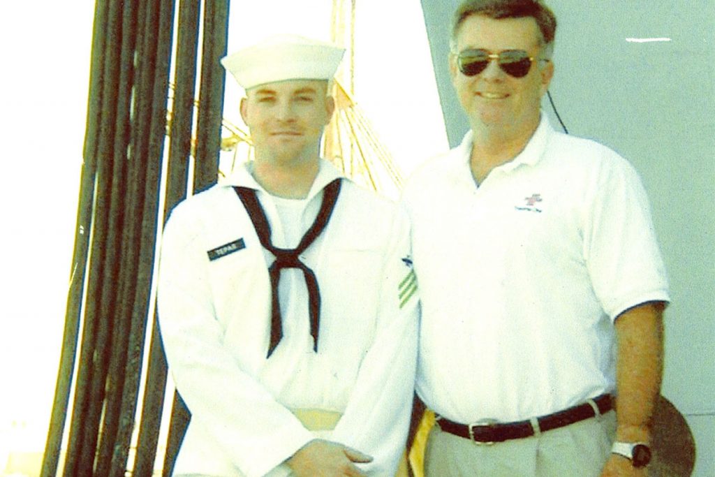 Tepas with his father pose on the quarter deck of the USS Boxer (LHD 4). They had just finished their long cross-country drive so that Tepas can report for duty. 