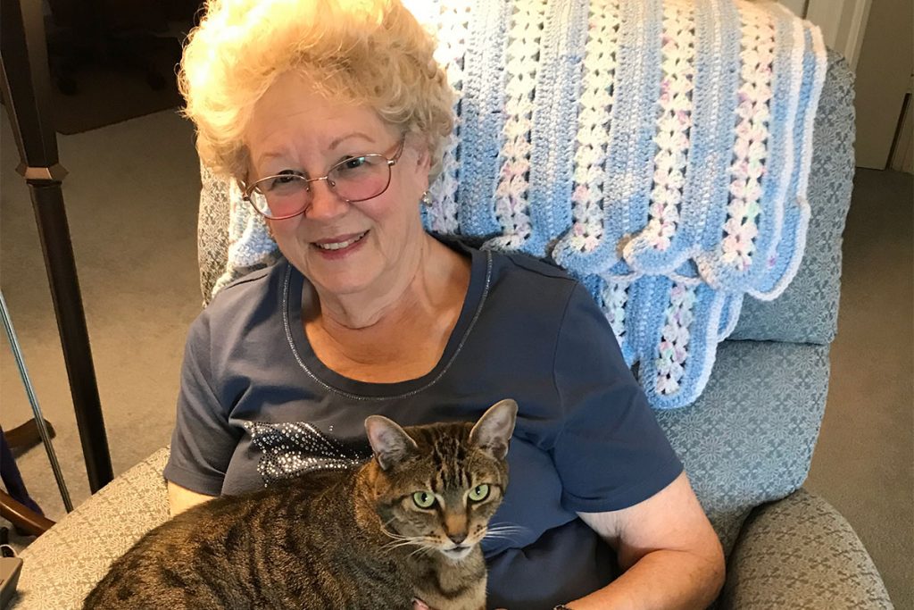 Julie Babcock with her rescue cat, Belle