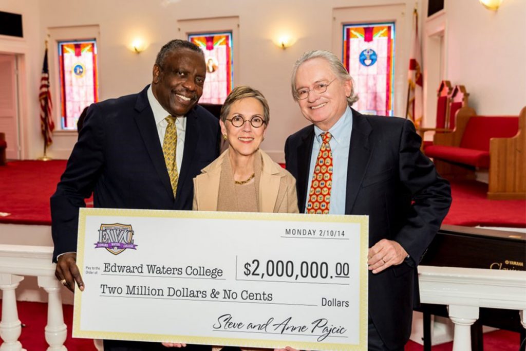Nat Glover, who at the time was President of Edward Waters College, Anne and Steve with their $2M donation.