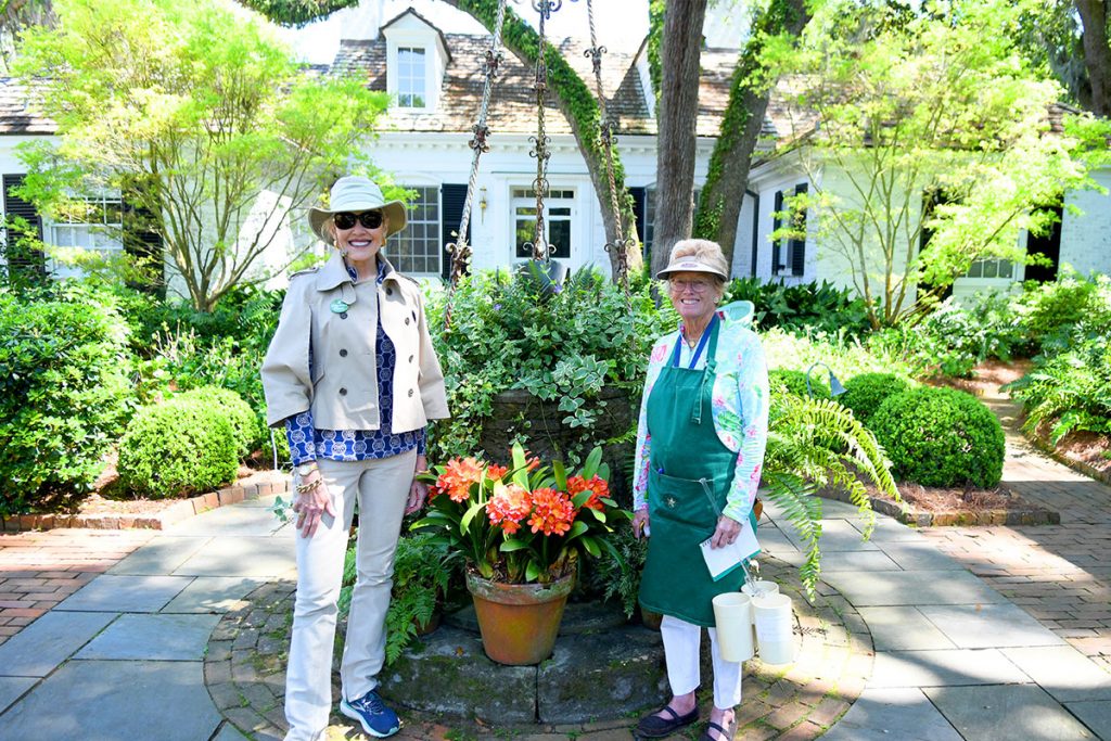 Susan Smathers, President of the Late Bloomers Garden Club with her friend, Leslie Pierpont, also of the Late Bloomers Garden Club, assisting as docents at the home of Ann Hicks in Ortega.