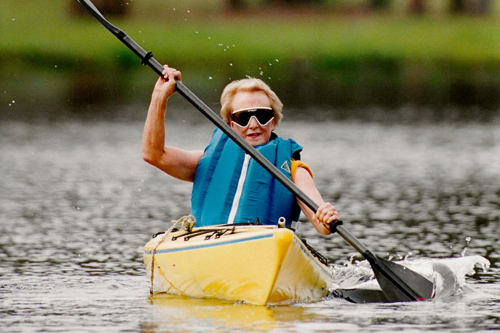 Dottie Dorion is kayaking on the lake
