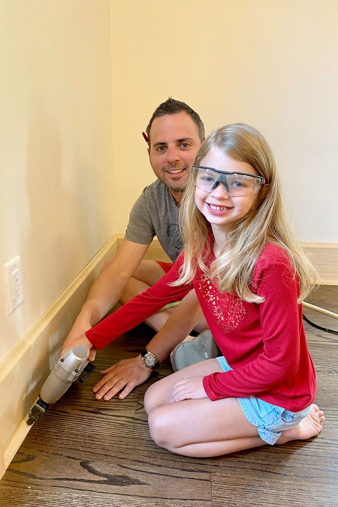 Tom York and daughter Meara working on home renovations