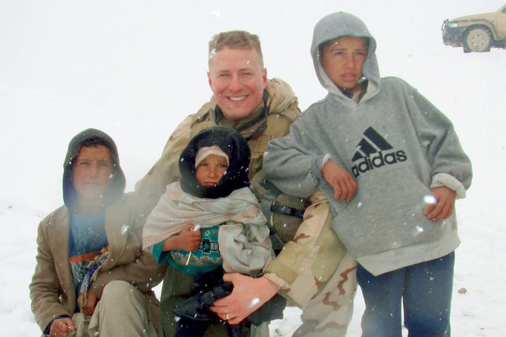 Jon Singleton with Afghan refugee children