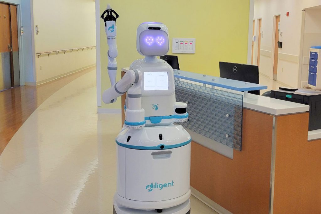 A pair of Moxi robots are now roaming the halls of the J. Wayne and Delores Barr Weaver Tower in an eight-month pilot program at Baptist Health. Photo by Michele Leivas.
