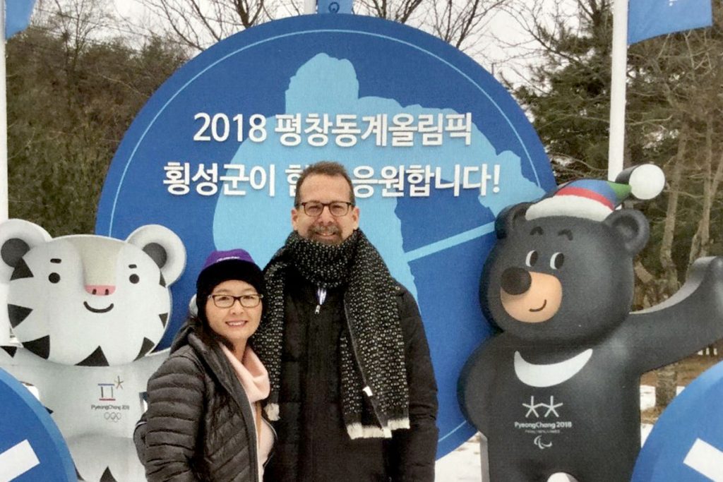 Amy Gilbert and her husband Mark at the 2018 Winter Olympics in Seoul — the trip that started it all.