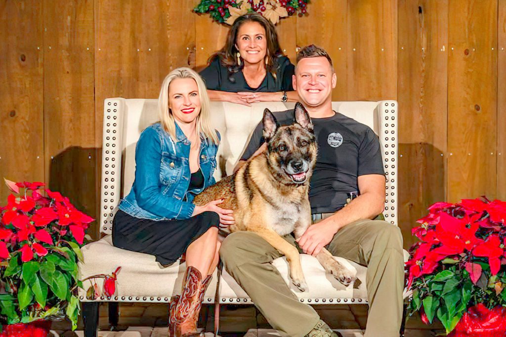 K9 United Founder Debbie Johnson with JSO Officer Cheth Plaugher, his wife Cheryl and K9 Huk.