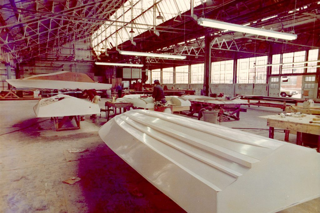 An interior shot of the old Ford Motor Plant, filled with Borum boats in various stages of completion.