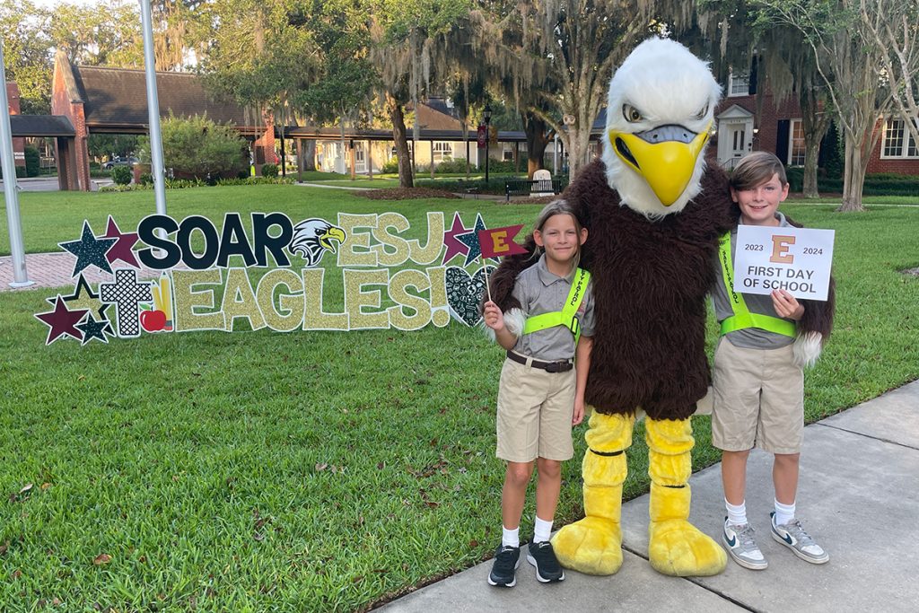 kids with eagle mascot