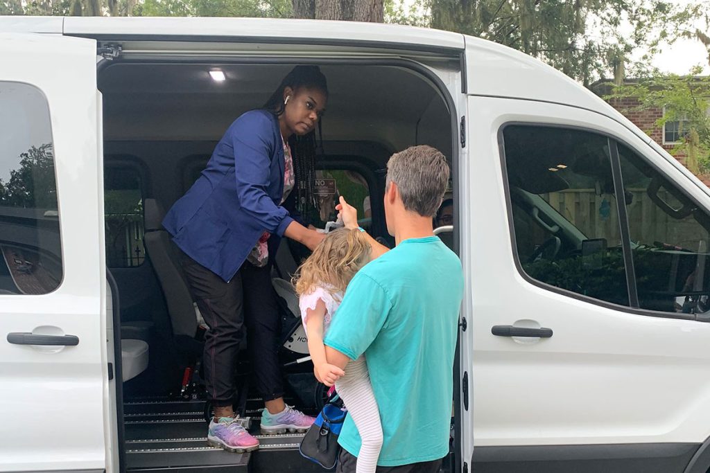 An accessible van picks Aidyn up every morning.