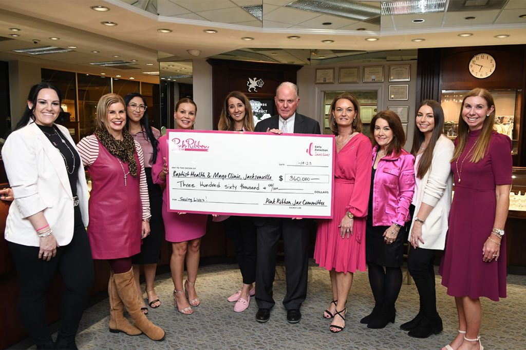 Underwood Jewelers celebrated the annual tradition of raising funds for Pink Ribbon Jax, a holiday shopping soiree accompanies a check presentation.