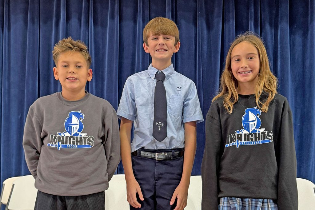 Assumption Catholic School Annual Spelling Bee winners Lucas, third place; Wyatt, second place; and Evelyn, first place.