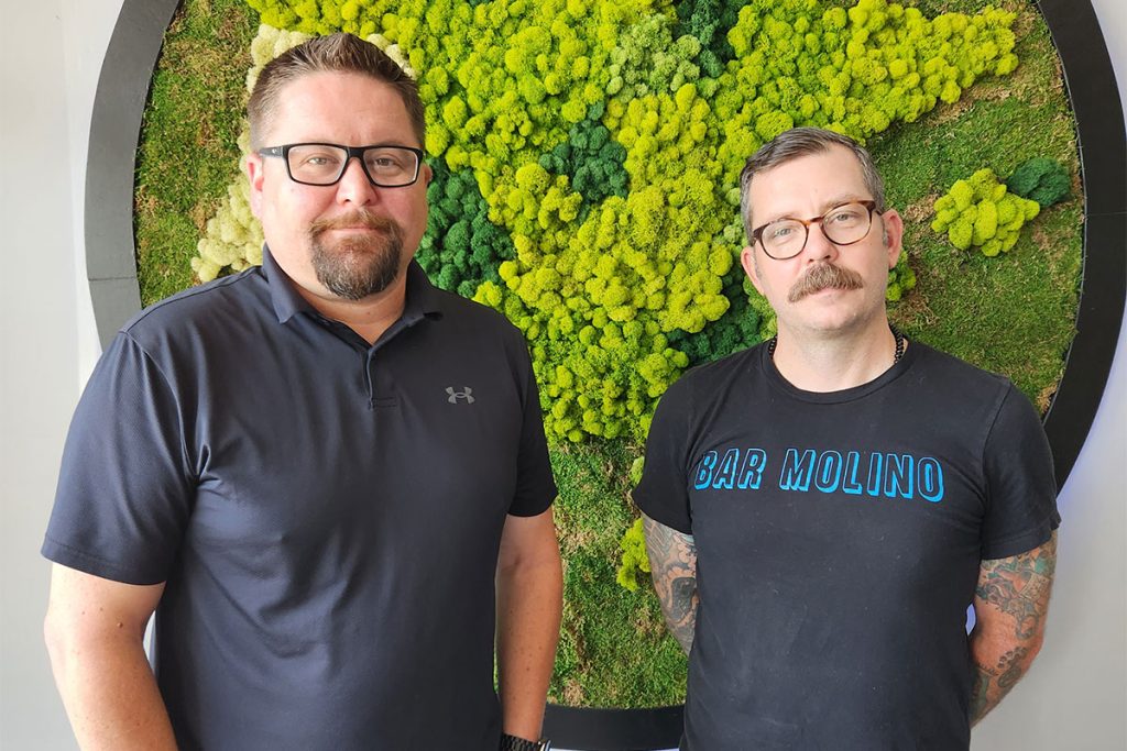The Swinerie and Bar Molino co-owner Kurt Rogers, right, with co-owner Alfred Young, coined the #HendricksCorridor on social media, launching the movement to raise visibility for the small businesses and restaurants along the avenue.