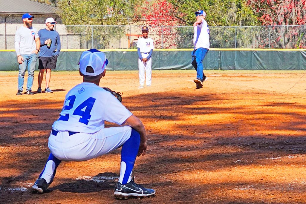 Hendricks Avenue Baseball League Board Member and former Commissioner Jason Eliopulos throws out the first pitch on at HABL’s Opening Day Ceremony on Saturday, Feb. 24, continuing a 78-year tradition of teaching life lessons and instilling a passion for baseball in neighborhood children.