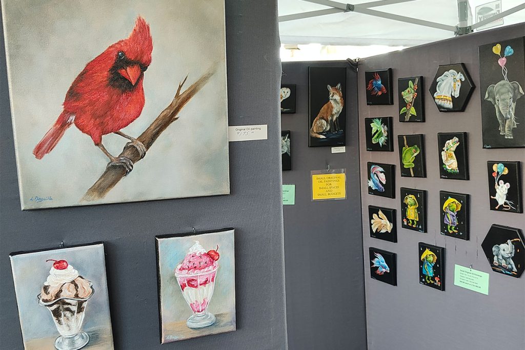 Laurel's paintings on display at the Arts Market