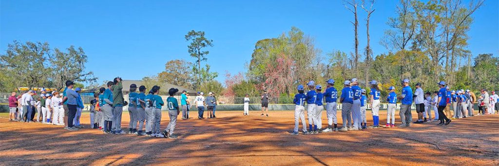 HABL teams lined up on the field to celebrate the start of a new season of baseball for the Opening Day Ceremony on Saturday, Feb. 24