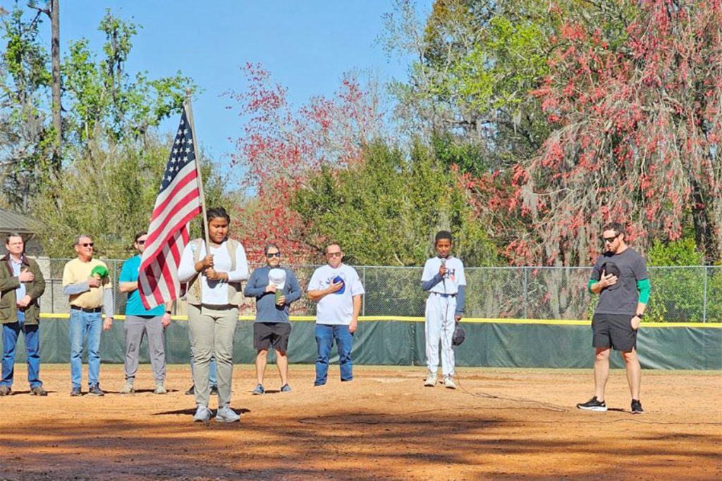 Girl Scout Troop 2325 presented the colors and HABL player Kebron sang the national anthem during the Opening Day Ceremony on Saturday, Feb. 24.