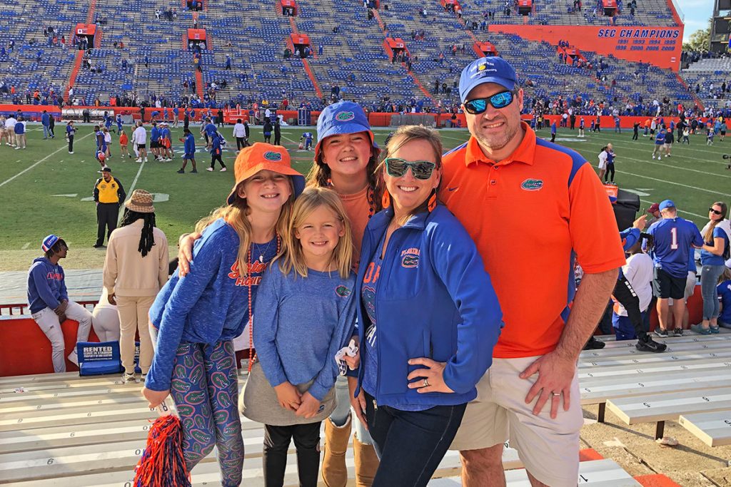 Sawyer, Mary Parker, Riley, Anna and Kevin Valent at a Florida Gator football game.