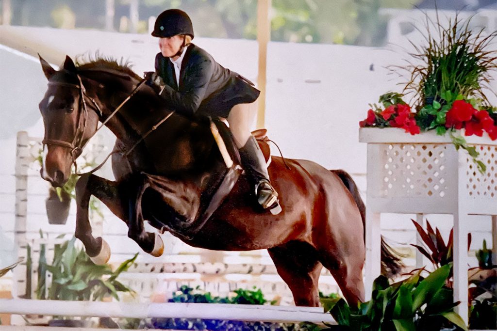 Kathryn McAvoy jumping her show horse Romeo.