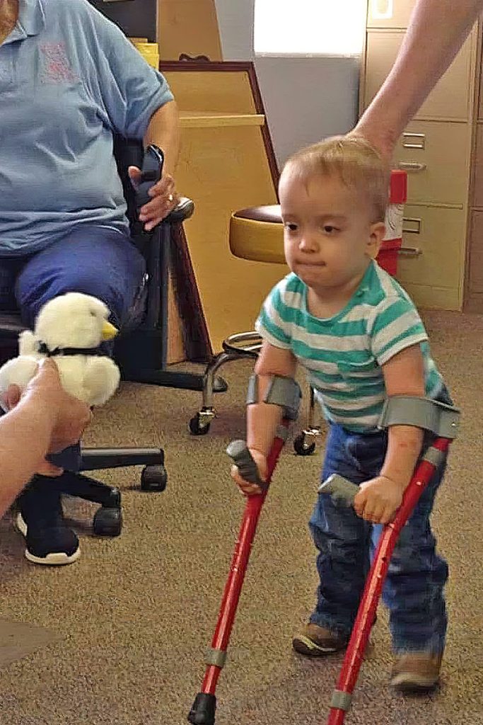 Liam Austin, who was born with spina bifida, spent four years working with Developmental Learning Center to learn to walk.