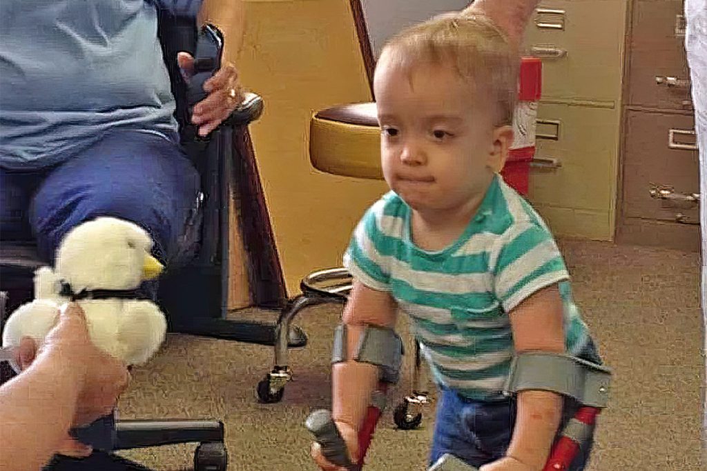 Liam Austin, who was born with spina bifida, spent four years working with Developmental Learning Center to learn to walk.