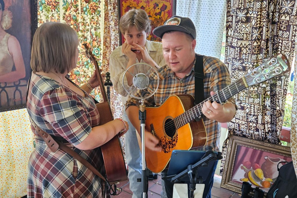 The Kimballs entertained on the Green House porch with bluegrass strumming and string picking.