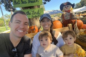 Dane and Amanda Bennett enjoy an afternoon at the pumpkin patch with their two sons.