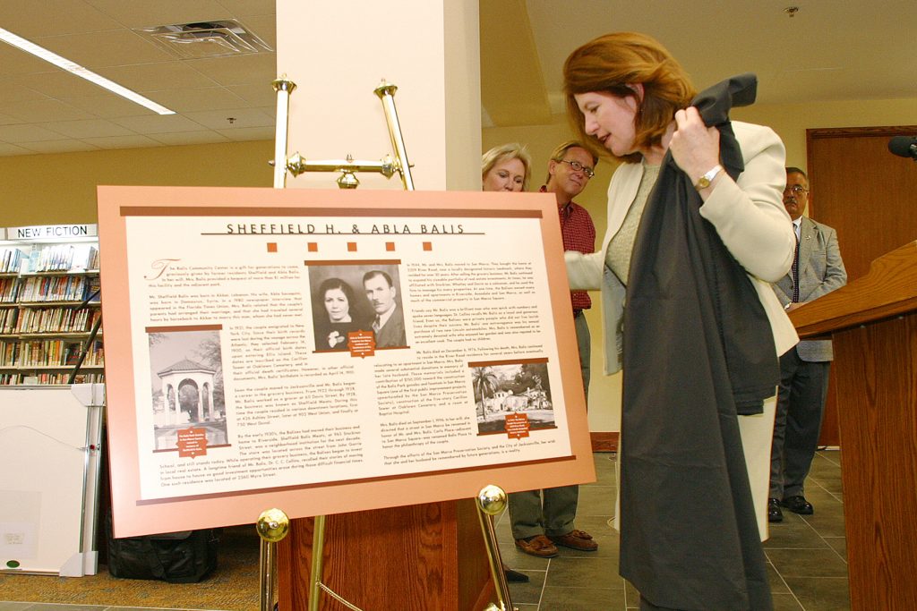 Lori Boyer, unveils a commemorative plaque back in 2003 at the San Marco Library.