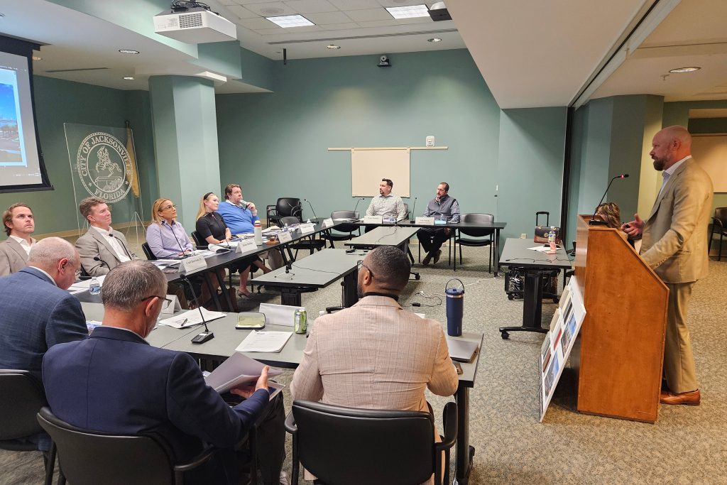 Hoefer Welker Managing Partner Trevor Lee addresses board members at the Jan. 16 DDRB meeting for conceptual and final approval of the Baptist Medical Center expansion project.