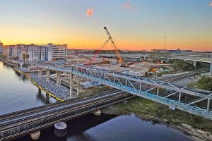 Construction at One Riverside continues to make strides as the development's residential towers near completion.