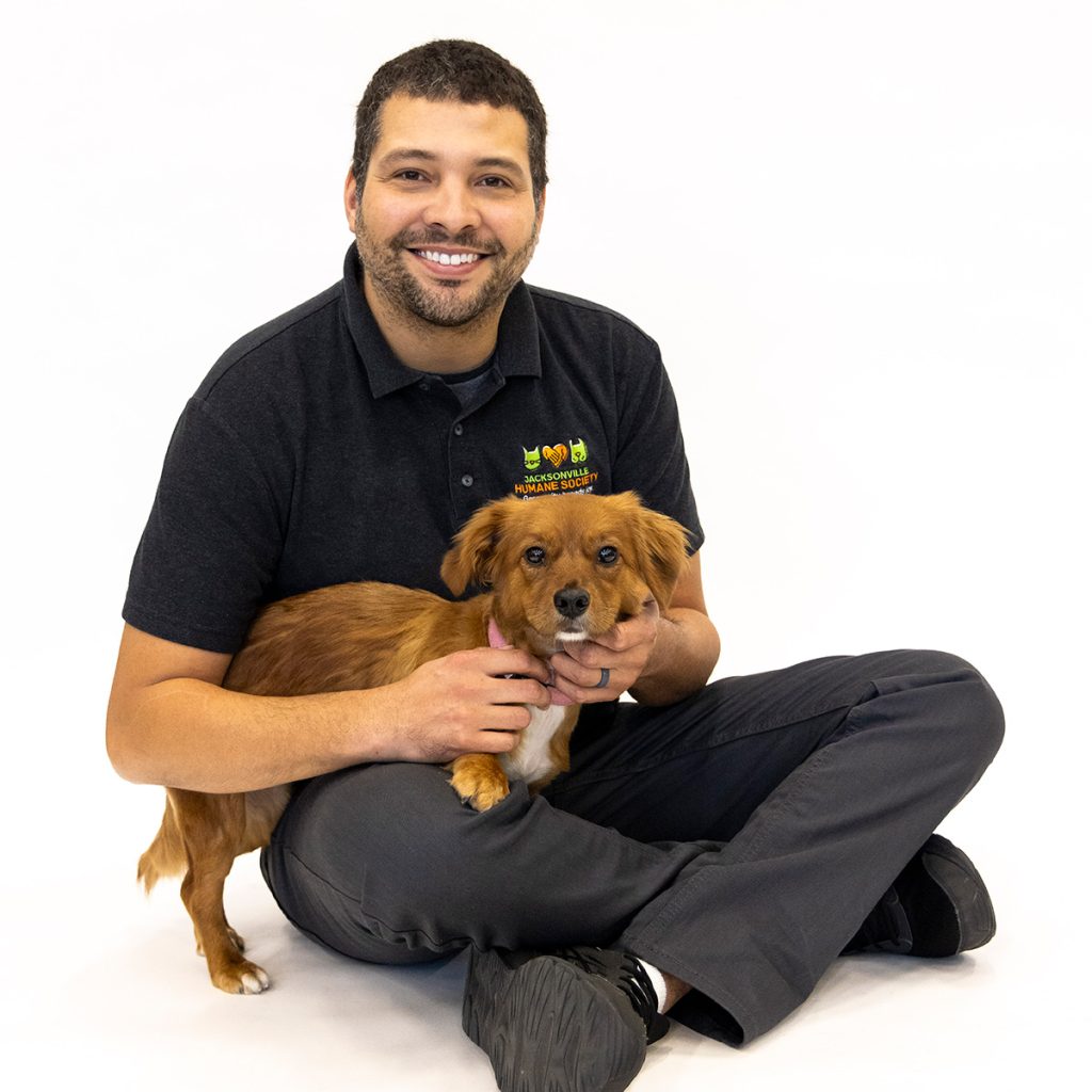 CEO Nicolas with an adoptable dog