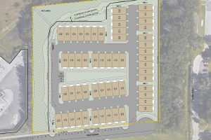 A site plan depicts the footprint of the TrailView townhomes situated along Reed Avenue.