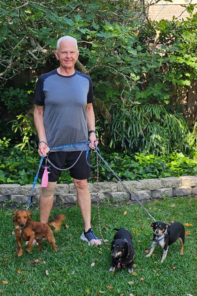 John Glessner and his three dogs, Leo, Lewis and Leia