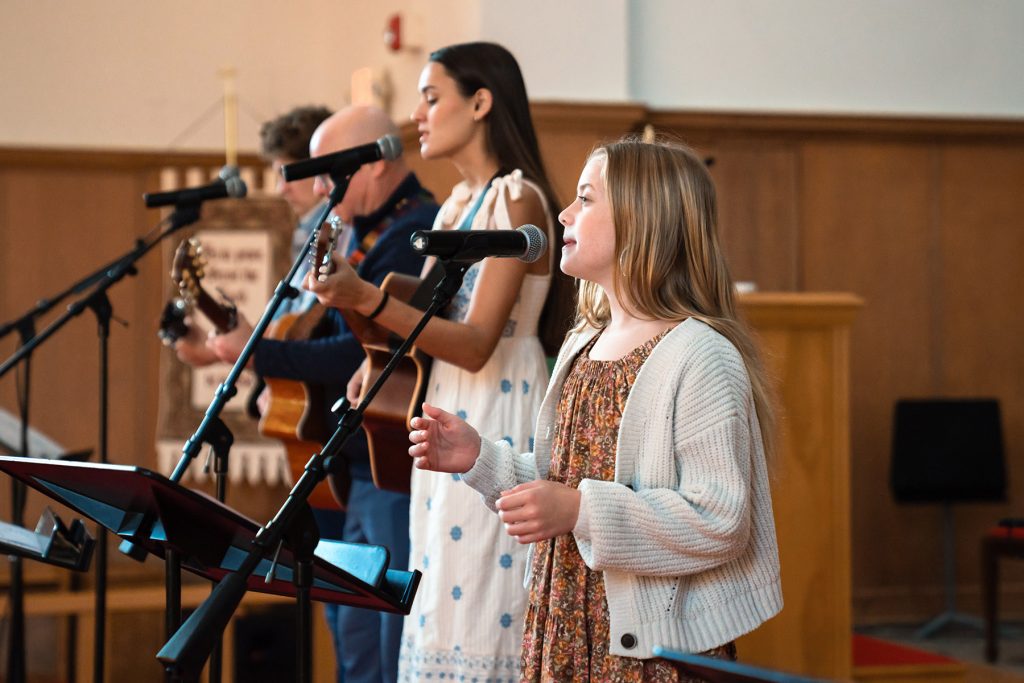 people singing inside Southside Methodist Church