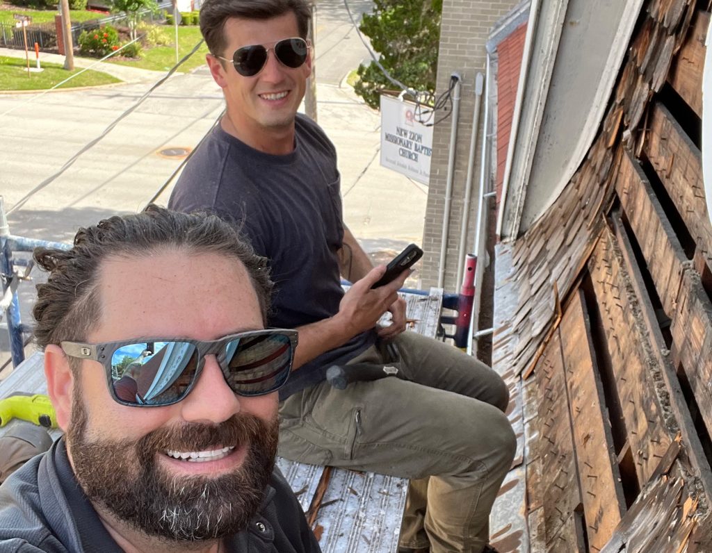 Tyler Douglas Lowe and Joseph Luycx working