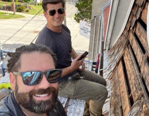 Tyler Douglas Lowe and Joseph Luycx working