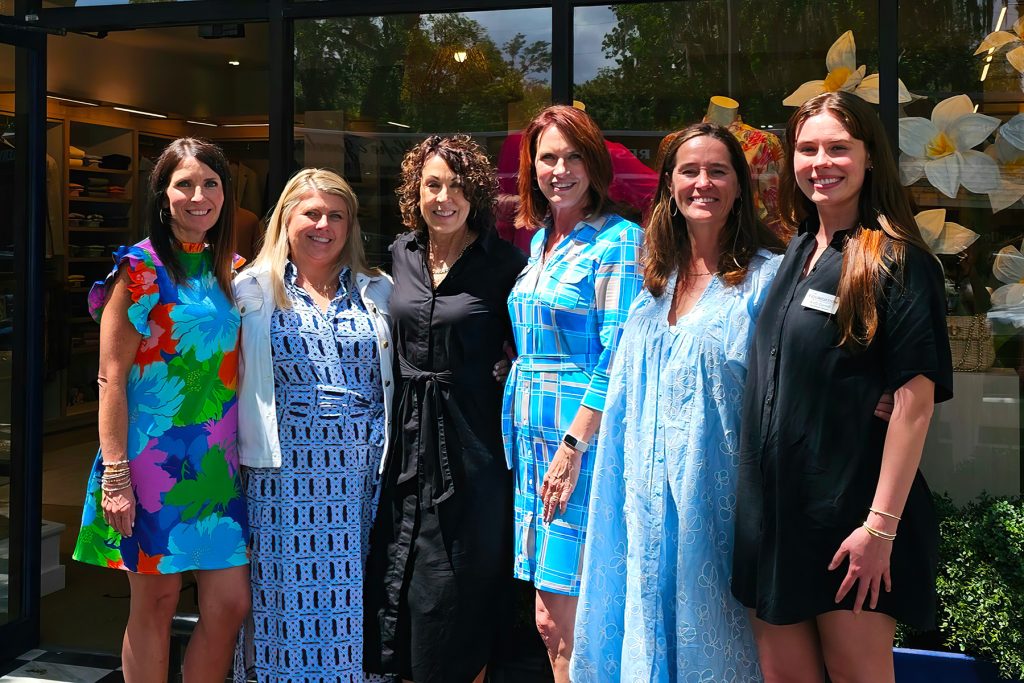 Erin Streva, Shelley Trevisol and Angela Hampton with Barbara Cornellier, Annie Tuttle and Kelli Caroll pose in front of J. McLaughlin’s new location in the Shoppes of Avondale.
