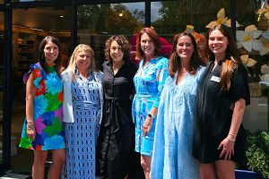 Erin Streva, Shelley Trevisol and Angela Hampton with Barbara Cornellier, Annie Tuttle and Kelli Caroll pose in front of J. McLaughlin’s new location in the Shoppes of Avondale.