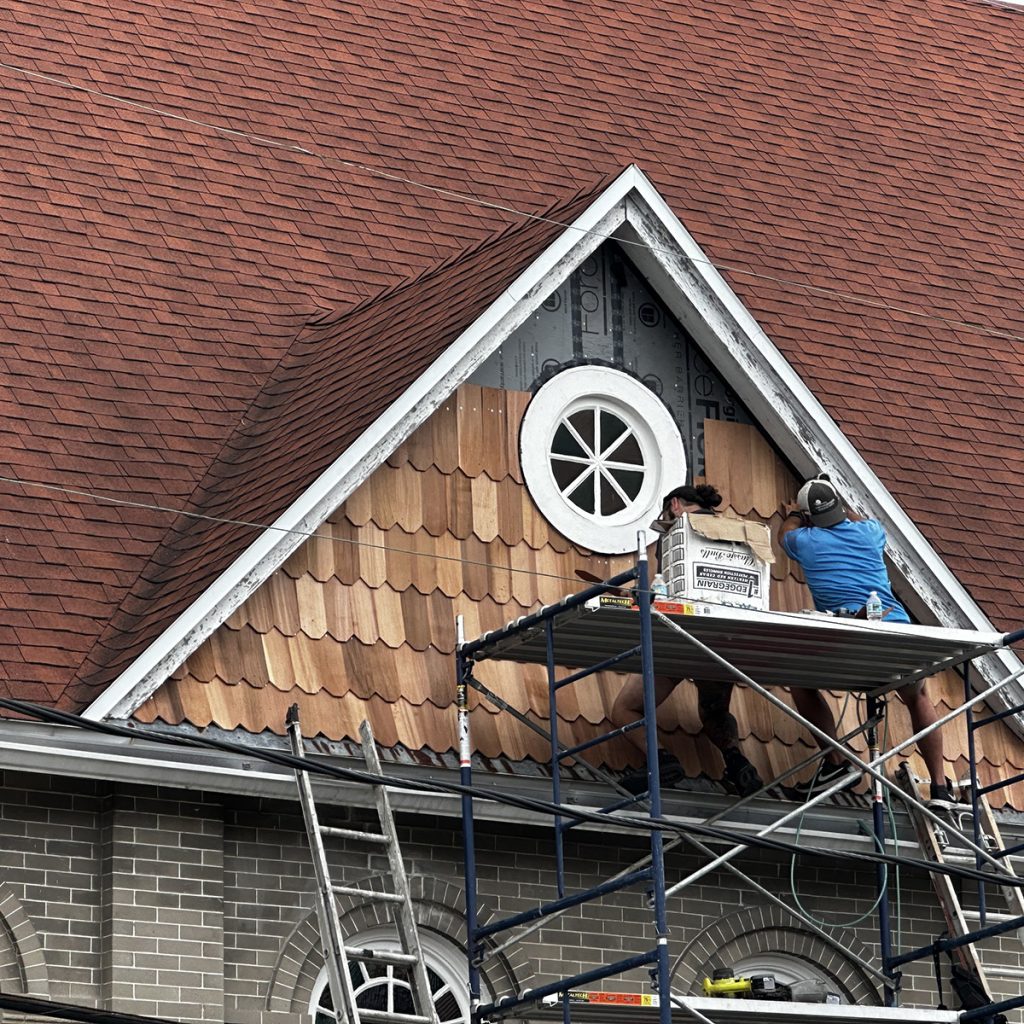 Tyler and Joe working on building face
