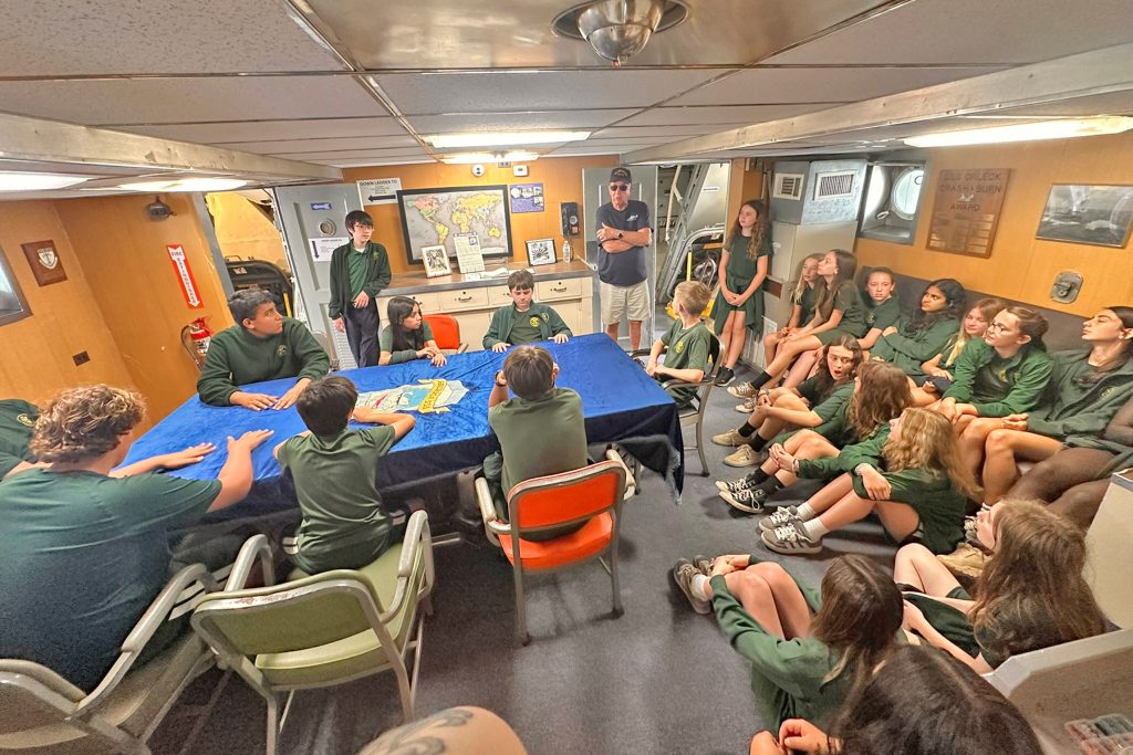 Sixth through eighth graders tour the USS Orleck.