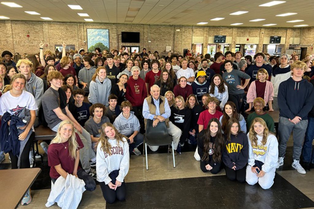 John poses with students from Episcopal School of Jacksonville for their 2024 Packathon.